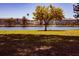 Scenic view of a pond and community buildings at 6015 19Th N St # 301, St Petersburg, FL 33714