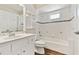 Bathroom featuring white vanity with marble countertop, updated fixtures, and shower-tub combo at 6080 Taneytown St, North Port, FL 34291