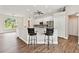 Kitchen area featuring counter seating, stainless appliances and ample cabinets at 6080 Taneytown St, North Port, FL 34291