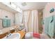 Clean bathroom featuring a shower-tub combination, vanity, and plenty of light at 616 Highview S Cir, Brandon, FL 33510