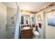 Cozy bathroom with shower, window and charming decor at 616 Highview S Cir, Brandon, FL 33510