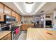 A well-equipped kitchen featuring stainless steel appliances, ample cabinetry, and a bright, open layout at 616 Highview S Cir, Brandon, FL 33510