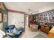 Inviting living room featuring a ceiling fan, closet and charming decor at 616 Highview S Cir, Brandon, FL 33510