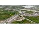 Aerial view of home in a community near highways, lakes and surrounded by greenery at 6260 Olivedale Dr, Riverview, FL 33578