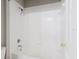 Bathroom featuring a white tiled tub/shower with modern shower head and fixtures at 6260 Olivedale Dr, Riverview, FL 33578