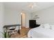 Bedroom with ceiling fan, desk, dresser, and ample natural light at 6260 Olivedale Dr, Riverview, FL 33578