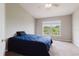 Bedroom featuring a window, ceiling fan, neutral walls, and carpet flooring at 6260 Olivedale Dr, Riverview, FL 33578