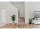 Entryway with staircase, wood-look flooring, neutral paint, and natural light at 6260 Olivedale Dr, Riverview, FL 33578