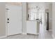 Inviting foyer with tile flooring, leading into a spacious dining area at 6260 Olivedale Dr, Riverview, FL 33578