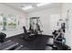 Community gym/fitness center with workout machines and free weights at 6260 Olivedale Dr, Riverview, FL 33578