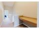 Hallway area featuring a built in desk and a view of a carpeted hallway at 6260 Olivedale Dr, Riverview, FL 33578