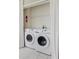 Convenient laundry room equipped with a washer and dryer set at 6260 Olivedale Dr, Riverview, FL 33578