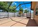 Covered patio in backyard provides shade and a relaxing outdoor space, with a view of privacy fence at 6365 32Nd N Ave, St Petersburg, FL 33710