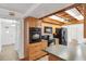 Kitchen with wood cabinets, stainless steel appliances, and a convenient breakfast bar at 6365 32Nd N Ave, St Petersburg, FL 33710