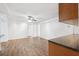 Spacious living area with wood-look floors, white walls, and an open layout for flexible living at 6365 32Nd N Ave, St Petersburg, FL 33710