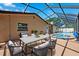 Outdoor patio, enclosed pool and spa combination at 6365 32Nd N Ave, St Petersburg, FL 33710