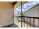 Screened patio with view of the community buildings and landscaping at 6428 Gloria Dr # 21, New Port Richey, FL 34653