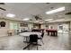 Spacious recreation room with tables, dart boards, and other games at 6428 Gloria Dr # 21, New Port Richey, FL 34653