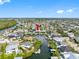 Beautiful canal front homes with direct access to open water, highlighted with red arrow at 6604 Dolphin Cove Dr, Apollo Beach, FL 33572
