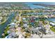 Waterfront property with a boat dock in a canal community captured from above at 6604 Dolphin Cove Dr, Apollo Beach, FL 33572
