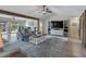 Spacious living room boasts modern decor, an entertainment center, and an open layout at 6604 Dolphin Cove Dr, Apollo Beach, FL 33572