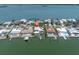 Waterfront property with private dock, pool, lush landscaping, and a prime location at 860 Harbor Is, Clearwater Beach, FL 33767