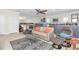 Spacious living room featuring model train layout and cozy seating arrangements at 860 Harbor Is, Clearwater Beach, FL 33767