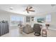 Inviting living room with water views, comfortable seating, and natural light at 860 Harbor Is, Clearwater Beach, FL 33767
