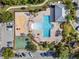 An aerial view of a community pool area, including a splash pad, basketball court and playground at 9031 Sienna Moss Ln, Riverview, FL 33578
