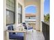 Inviting balcony featuring comfortable seating and tranquil views at 916 Seagrape Dr, Ruskin, FL 33570