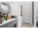 Elegant bar area with custom countertops and decorative mirror at 916 Seagrape Dr, Ruskin, FL 33570