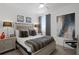 Comfortable bedroom with a decorative headboard, plush blankets, and decorative accents at 916 Seagrape Dr, Ruskin, FL 33570