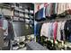 A well-organized walk-in closet with shelving and hanging space for clothing and shoes provides ample storage at 916 Seagrape Dr, Ruskin, FL 33570