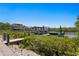 Picturesque dock with boat lift and view of waterfront home at 916 Seagrape Dr, Ruskin, FL 33570