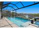 Inviting pool with sun loungers and expansive waterfront views at 916 Seagrape Dr, Ruskin, FL 33570