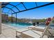 Stunning pool and spa with waterfront views, perfect for relaxation at 916 Seagrape Dr, Ruskin, FL 33570