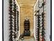 Custom wine cellar with wood accents and extensive bottle storage at 916 Seagrape Dr, Ruskin, FL 33570