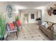 Inviting lobby with comfortable seating and stylish decor creates a welcoming atmosphere for residents and visitors at 950 Broadway # 103, Dunedin, FL 34698