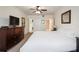 Bedroom with ceiling fan, double closets and ensuite access at 950 Broadway # 103, Dunedin, FL 34698