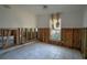 Bedroom featuring tile floor and natural light, requiring renovation and offering potential for customization at 9810 Parsons St, Tampa, FL 33615