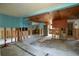 Spacious open living space with wood ceiling ready for complete renovation and restoration at 9810 Parsons St, Tampa, FL 33615
