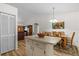 Dining area with wood table, chairs, and ample space for Gathering gatherings at 1017 Hamilton Ave, Tarpon Springs, FL 34689