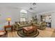 Comfortable living room with large windows and cozy seating arrangements at 1017 Hamilton Ave, Tarpon Springs, FL 34689