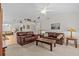Bright, spacious living room with hardwood floors and comfortable seating for gatherings and relaxation at 1017 Hamilton Ave, Tarpon Springs, FL 34689