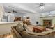 Bright, open living space with a fireplace, connecting the kitchen and living areas at 1017 Hamilton Ave, Tarpon Springs, FL 34689