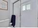Bright bathroom features a glass shower stall with modern fixtures and design at 1101 Mclean St, Dunedin, FL 34698
