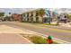 Streetscape featuring commercial buildings with colorful murals and a fire hydrant in the foreground at 1101 Mclean St, Dunedin, FL 34698