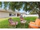Lush backyard with lawn furniture and pool, ideal for entertaining and relaxation at 11845 Newberry Grove Loop, Riverview, FL 33579