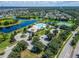 Aerial view of community amenities including pool, tennis courts, and well-maintained landscaping at 11845 Newberry Grove Loop, Riverview, FL 33579