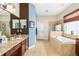 Luxurious main bathroom featuring a soaking tub, dual vanity, and separate shower at 11845 Newberry Grove Loop, Riverview, FL 33579